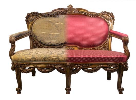 Antique vintage sofa with authentic fabric and wood carving and gilding before and after restoration , in a single photo